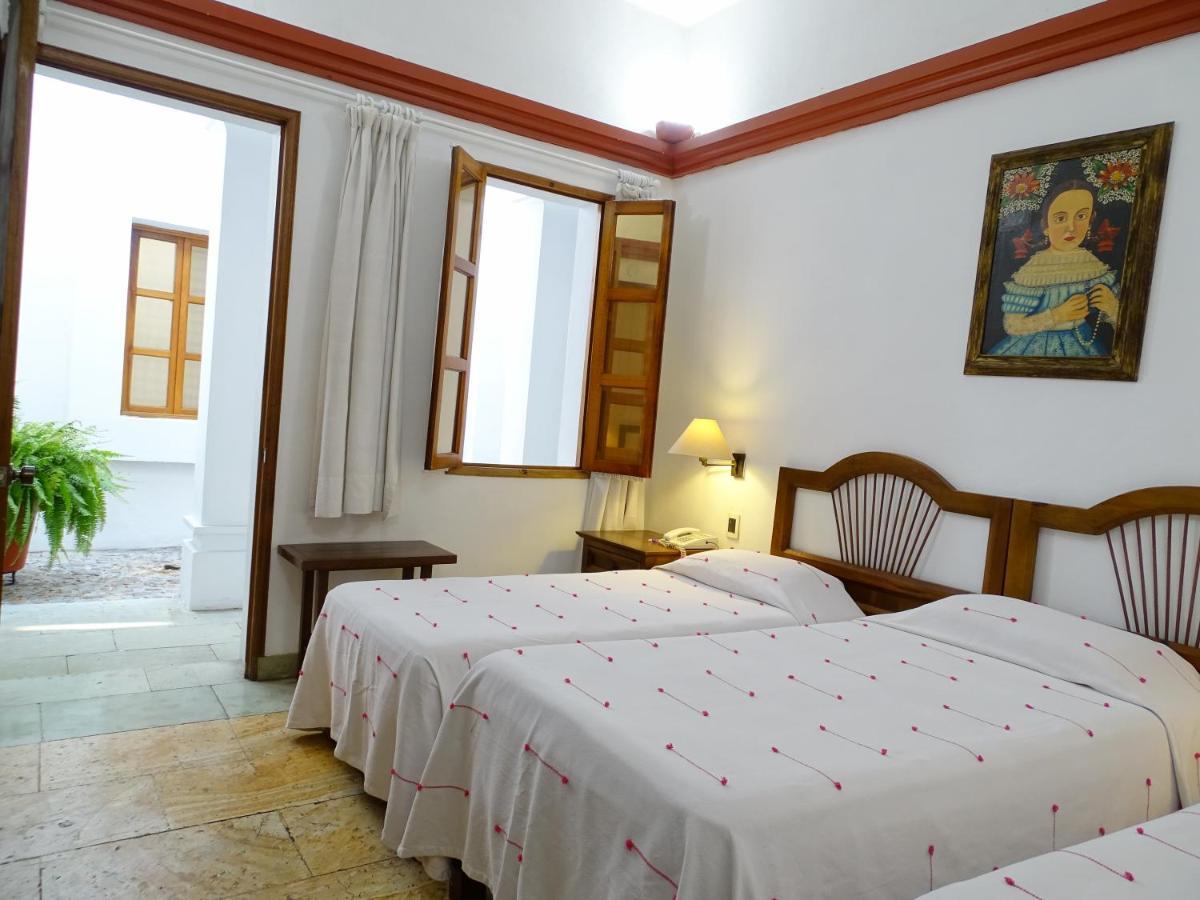 โฮเต็ล ไอทาน่า Hotel Oaxaca ภายนอก รูปภาพ
