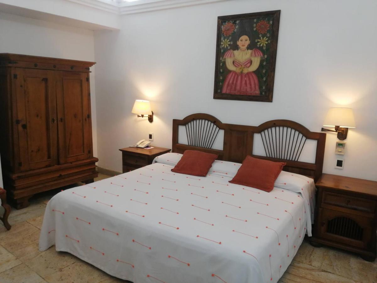 โฮเต็ล ไอทาน่า Hotel Oaxaca ภายนอก รูปภาพ